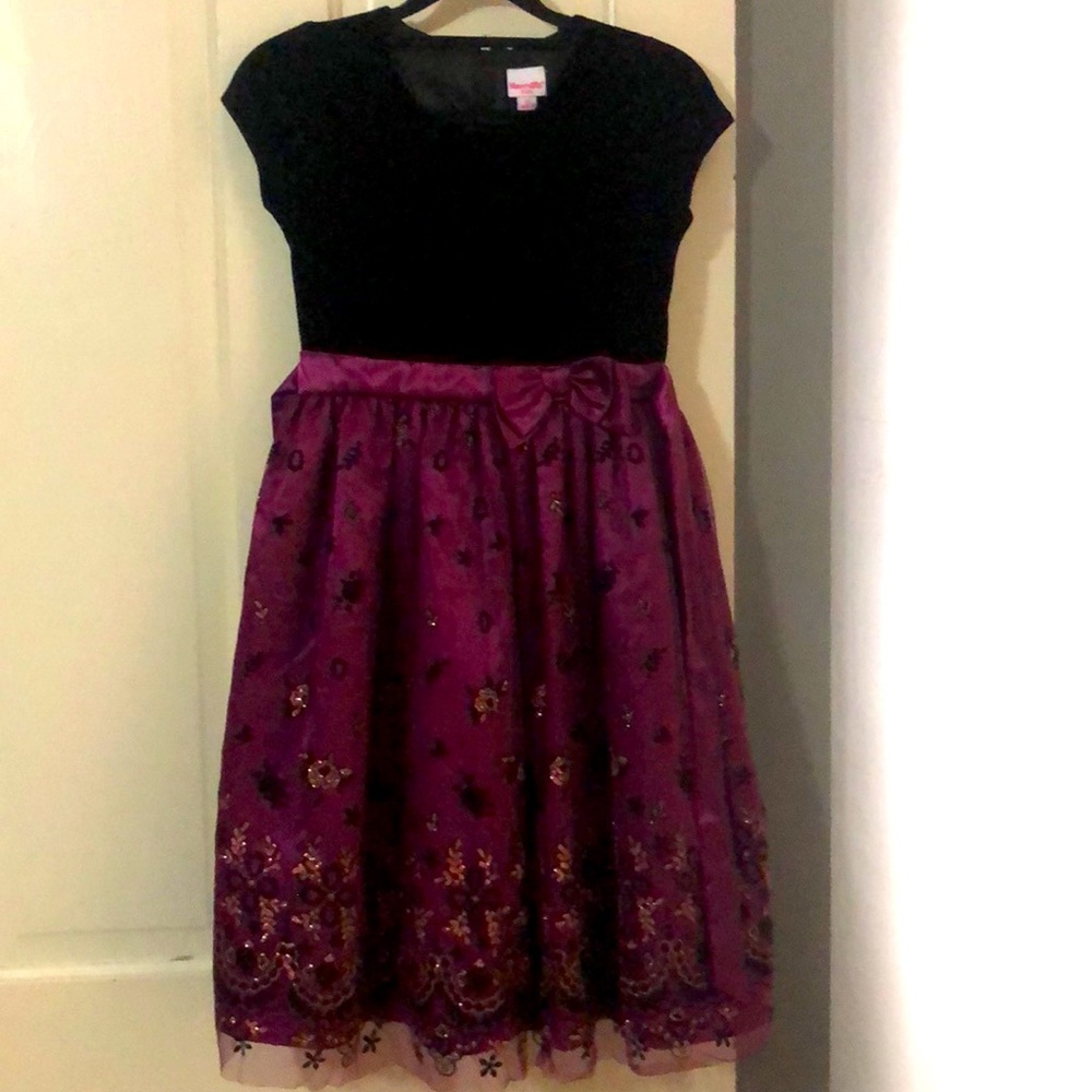 Nannette kids (size 12) dress. It’s purple and black, and when wearing very cute